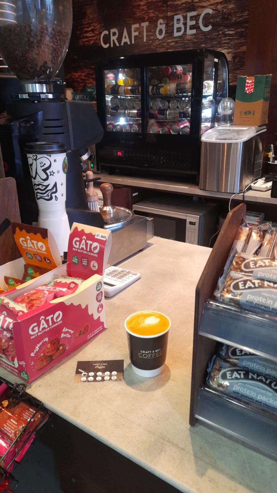 The Craft & Bec kiosk counter and back bar with the coffee machine and snack boxes